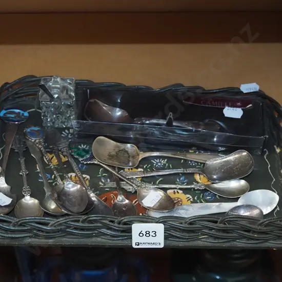 tray of souvenir teaspoons