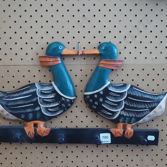 carved duck themed coat hooks