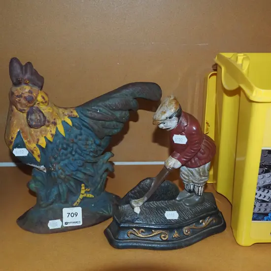 cast iron chicken and golfer doorstops