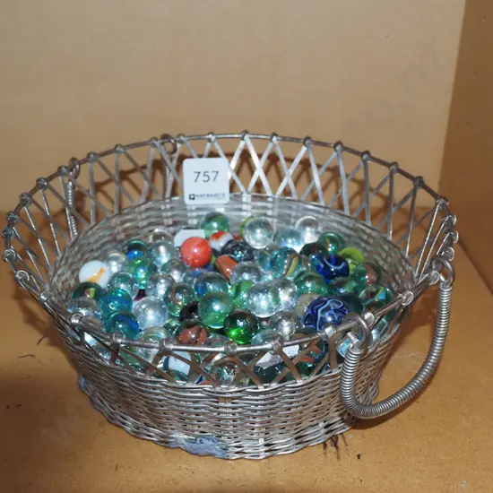 metal basket and marbles