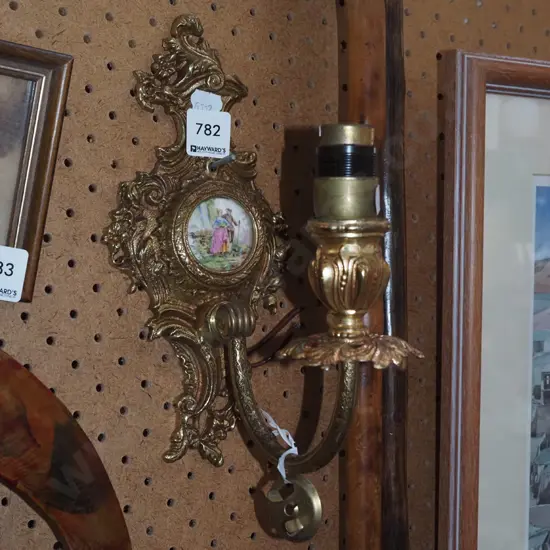 brass wall mounted light fitting with ceramic insert