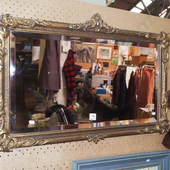 gilt framed ornate rose tinted wall mirror - some cracks in frame