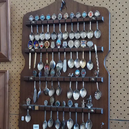 souvenir teaspoons on stand