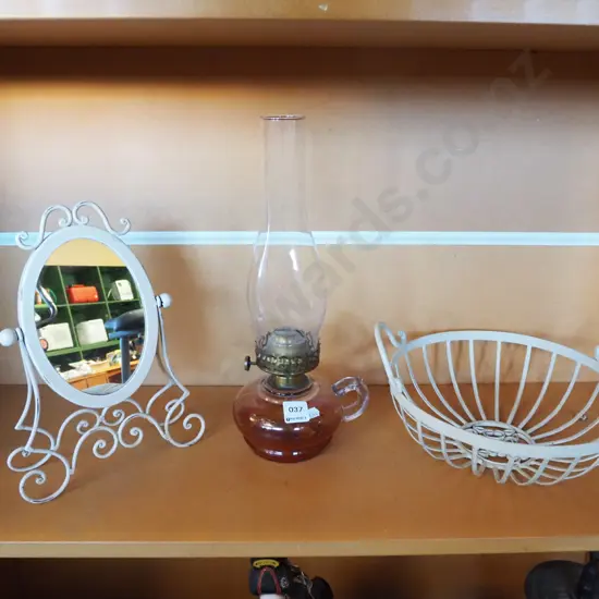 wrought metal mirror, fruit bowl, lantern