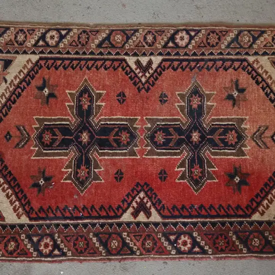 small woollen floor mat - some fading and wear L1250 W765