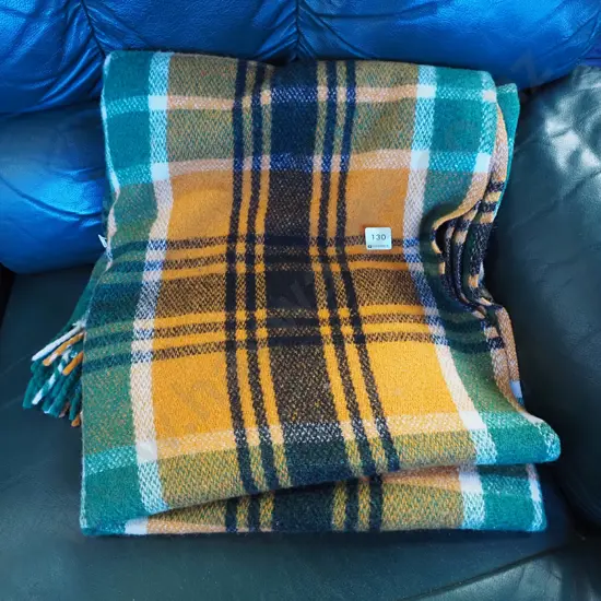 green and orange travel blanket