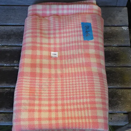 pink and white woollen blanket