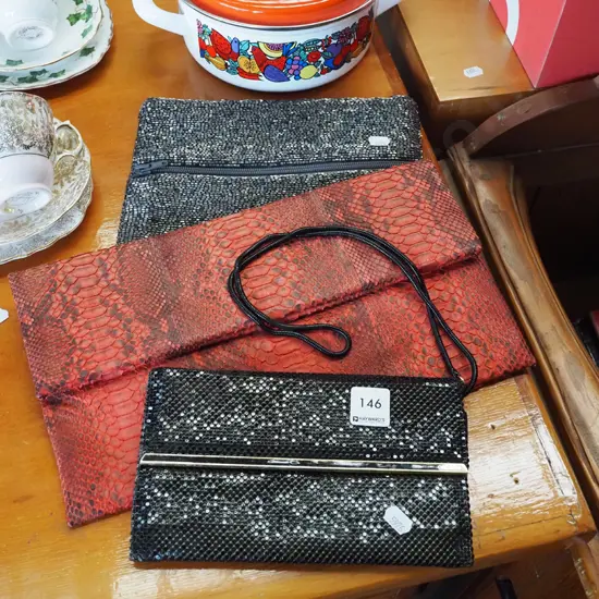 alligator skin and other  clutch purses