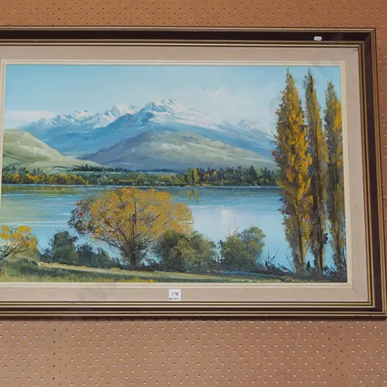 framed oil - lake and mountain scene