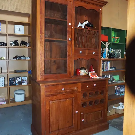 Indonesian hardwood wall unit - 2 solid and 1 glazed door, plate rack, wine rack etc