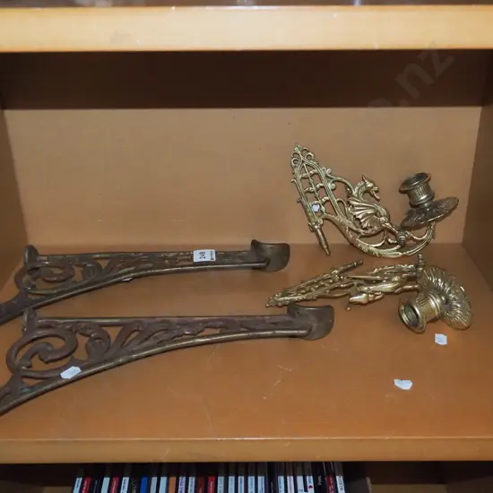 pair of cast metal phoenix sconces and a pair of cast metal Victorian shelf brackets