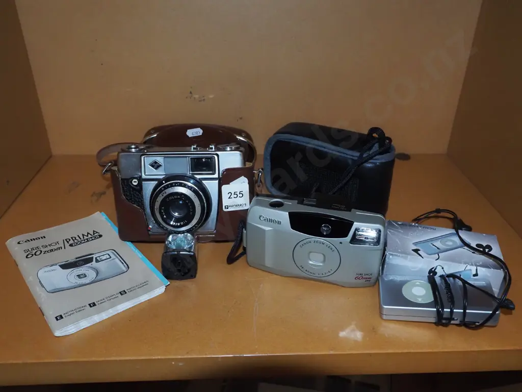 Agfa leather cased camera, Canon 35mm camera, small FM/Am radio Image 1++