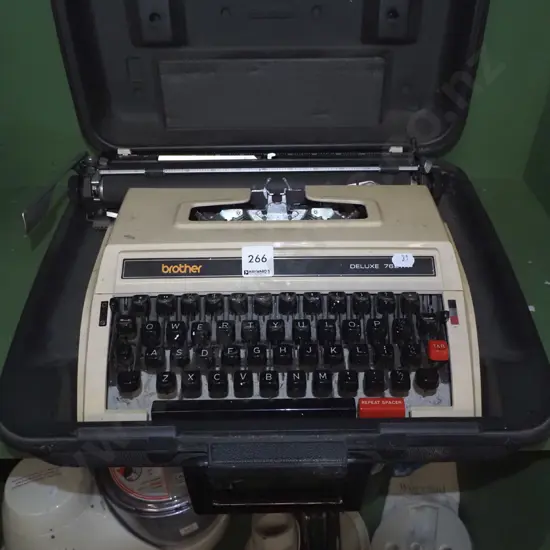 plastic cased Brother typewriter