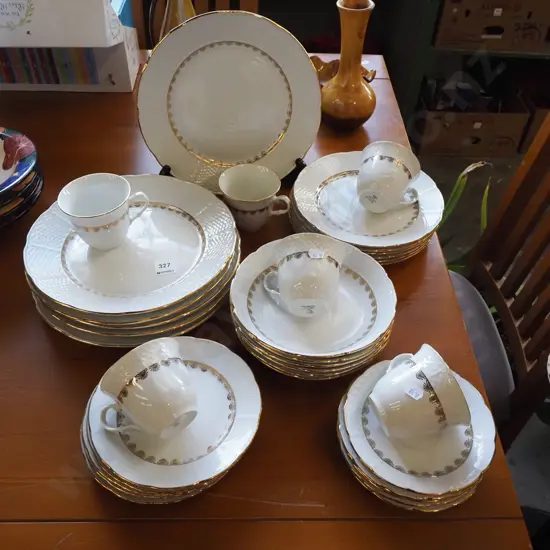 assorted Czechoslavakian cream and gold dinner items; plates, bowls etc