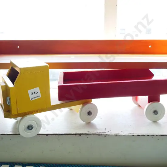 hand made wooden toy truck and trailer