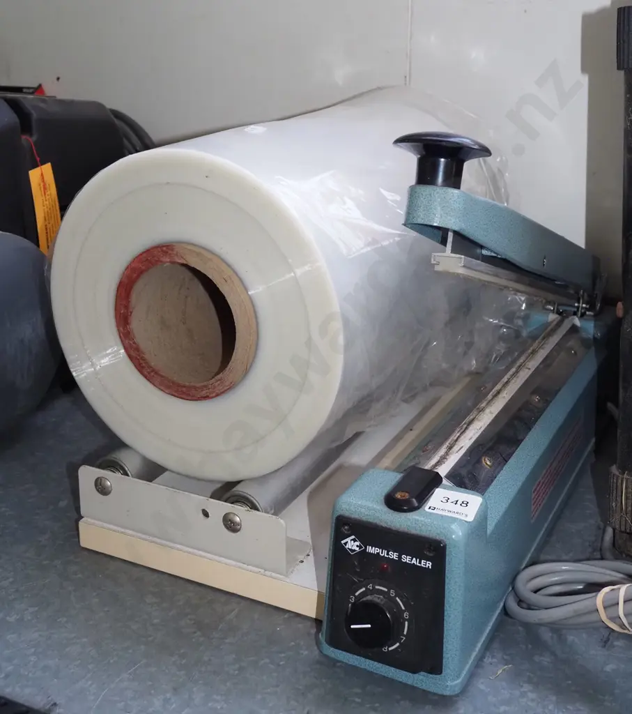 Impulse electric sealer, roll of plastic Image 1++