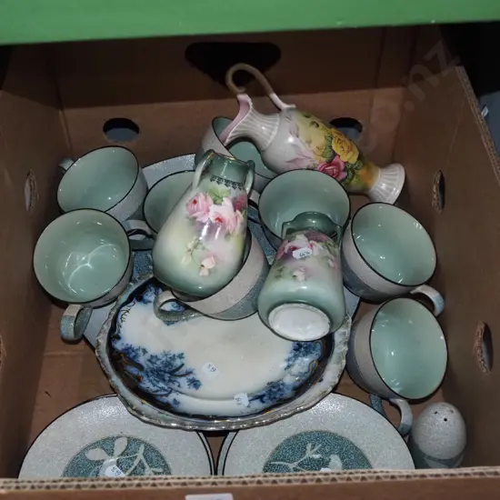 box; coffee cups, plates, salt and pepper