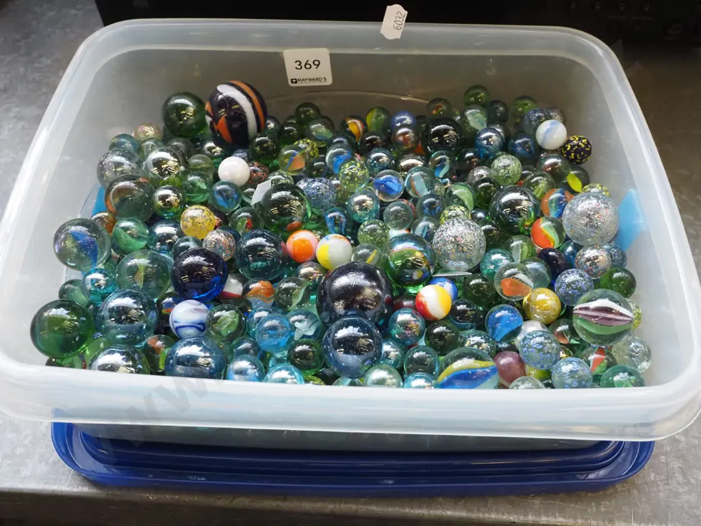 plastic container and marbles Image 1++
