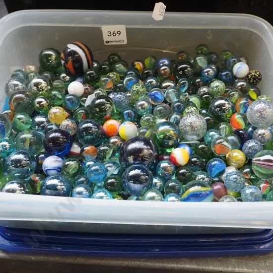 plastic container and marbles