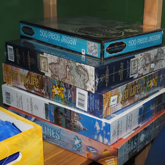 5x as new unopened jigsaws