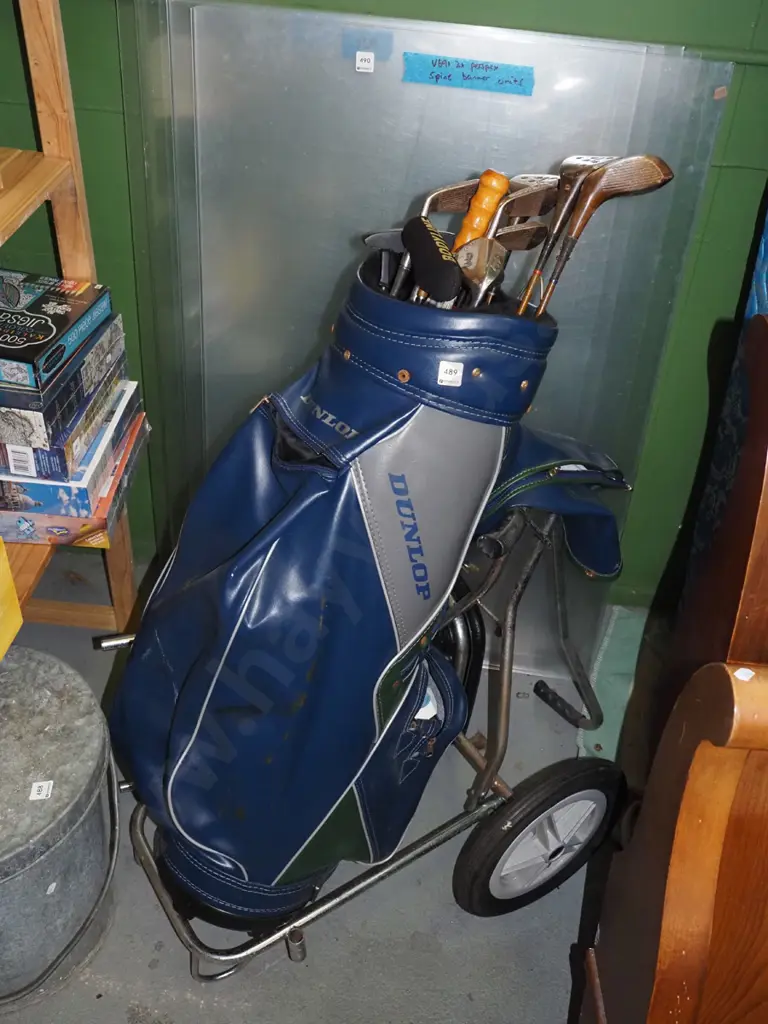 golf clubs and trundler Image 1++