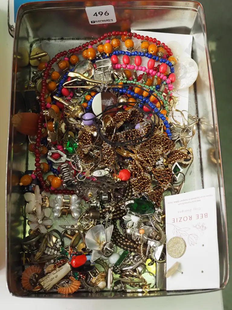 tin of costume jewellery Image 1++