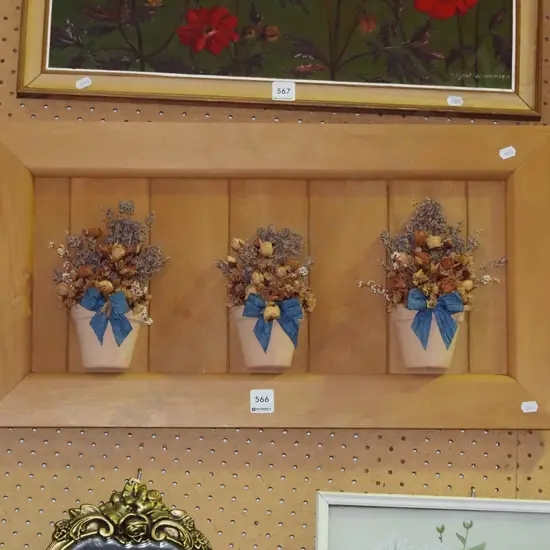 3D rimu terracotta and dried flowers on board