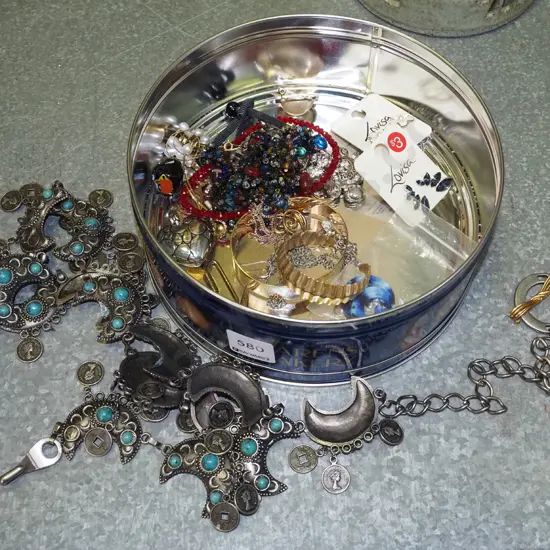 tin of costume jewellery