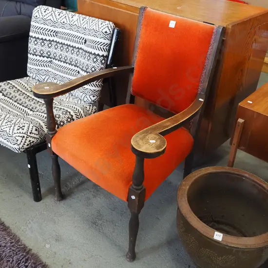 wood and rust upholstered armchair