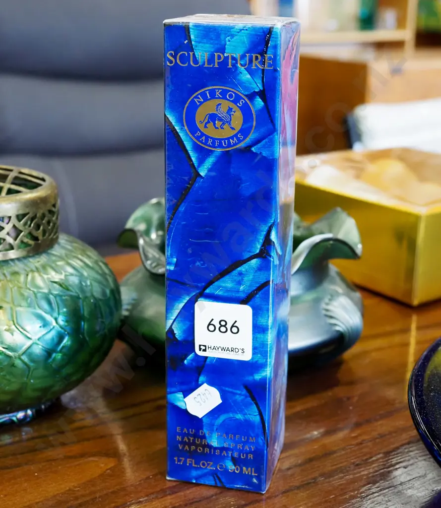 bottle of Nikos parfum sculptor perfume Image 1++