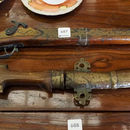 reproduction musket, knife in sheath