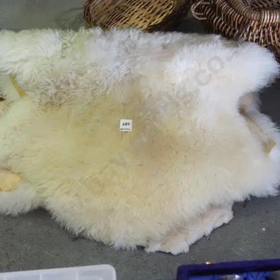 2x woollen sheepskins