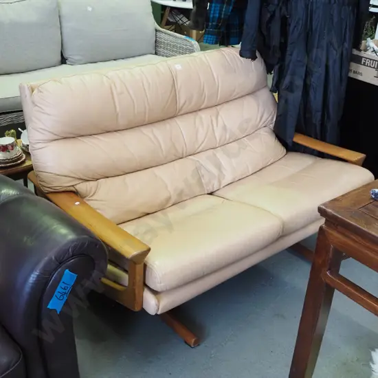 1980s salmon coloured leather and wood 2 seater settee -some wear