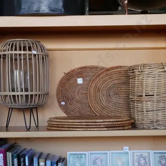 cane placemats, basket, candle lantern