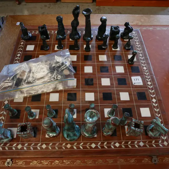 inlaid chess board with 2 sets of chess pieces