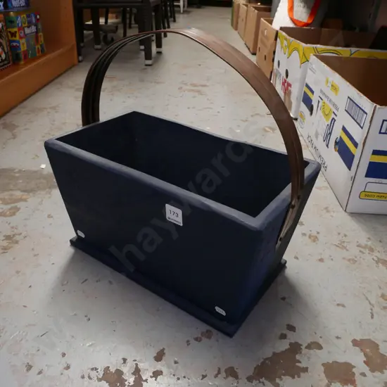 copper handled wooden basket