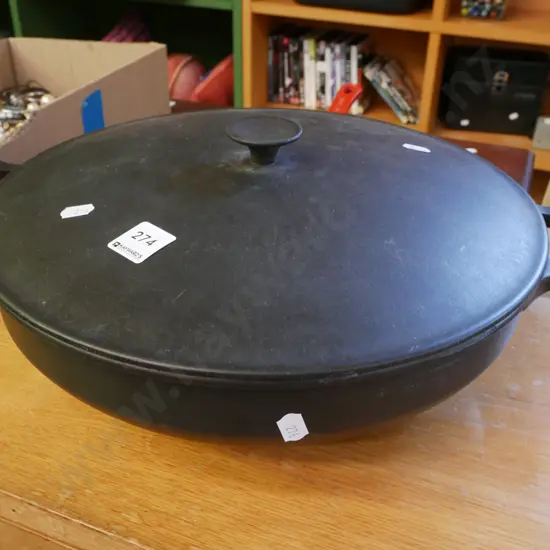 cast iron lidded wok
