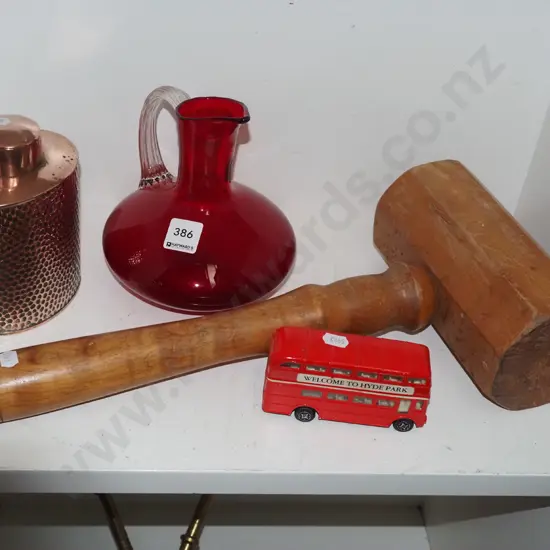 heavy wooden mallet, toy bus, ruby glass jug, lidded copper canister