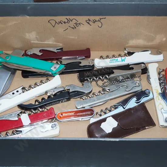 box of pocket knives, bottle openers