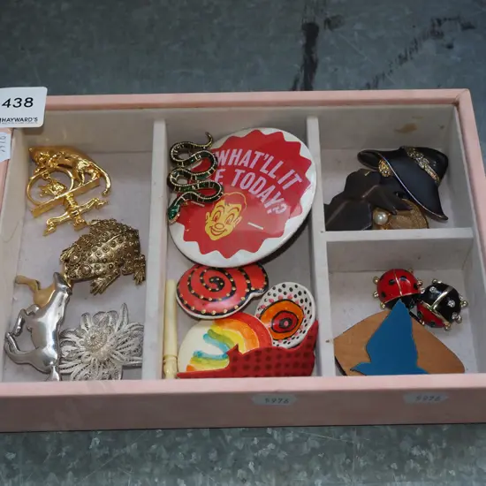 box; badges, brooches