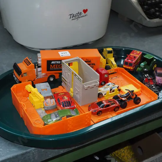 plastic tray; toy vehicles