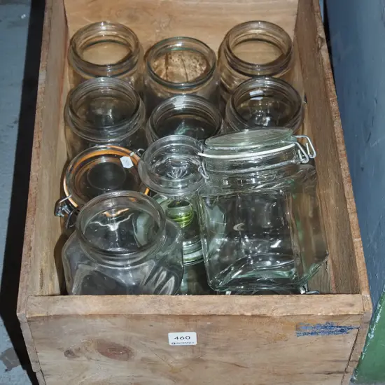wooden box of various glass jars