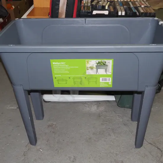 grey plastic raised planter bed