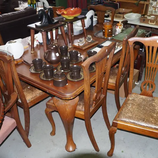 Edwardian walnut wind out table with 7 Heppelwhite style chairs