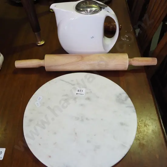 modern teapot, rolling pin, marble cheese board