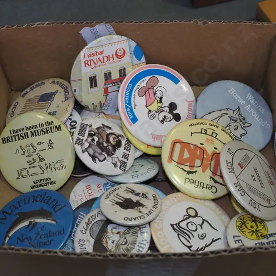 tray of various badges
