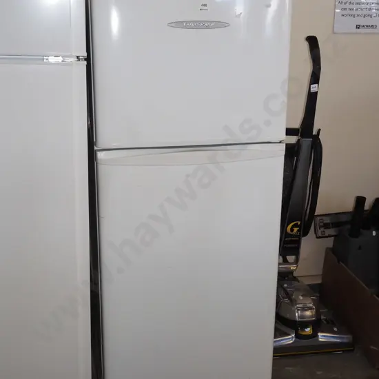 F&P fridge freezer H-1230 W-540 D-550 missing back left foot