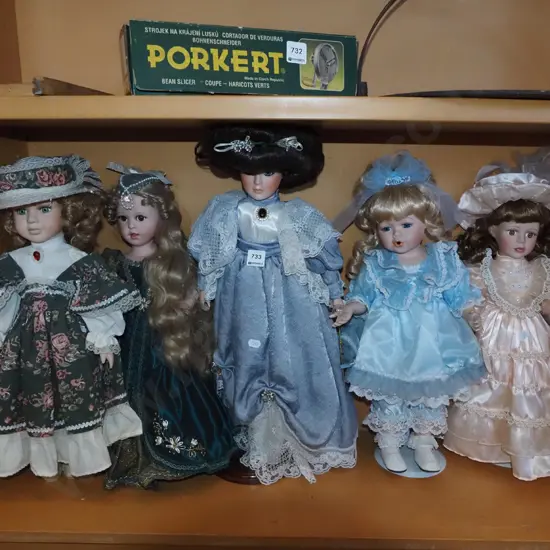 shelf of 5 porcelain display dolls Tallest H-520