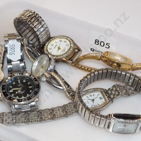 tray of wristwatches