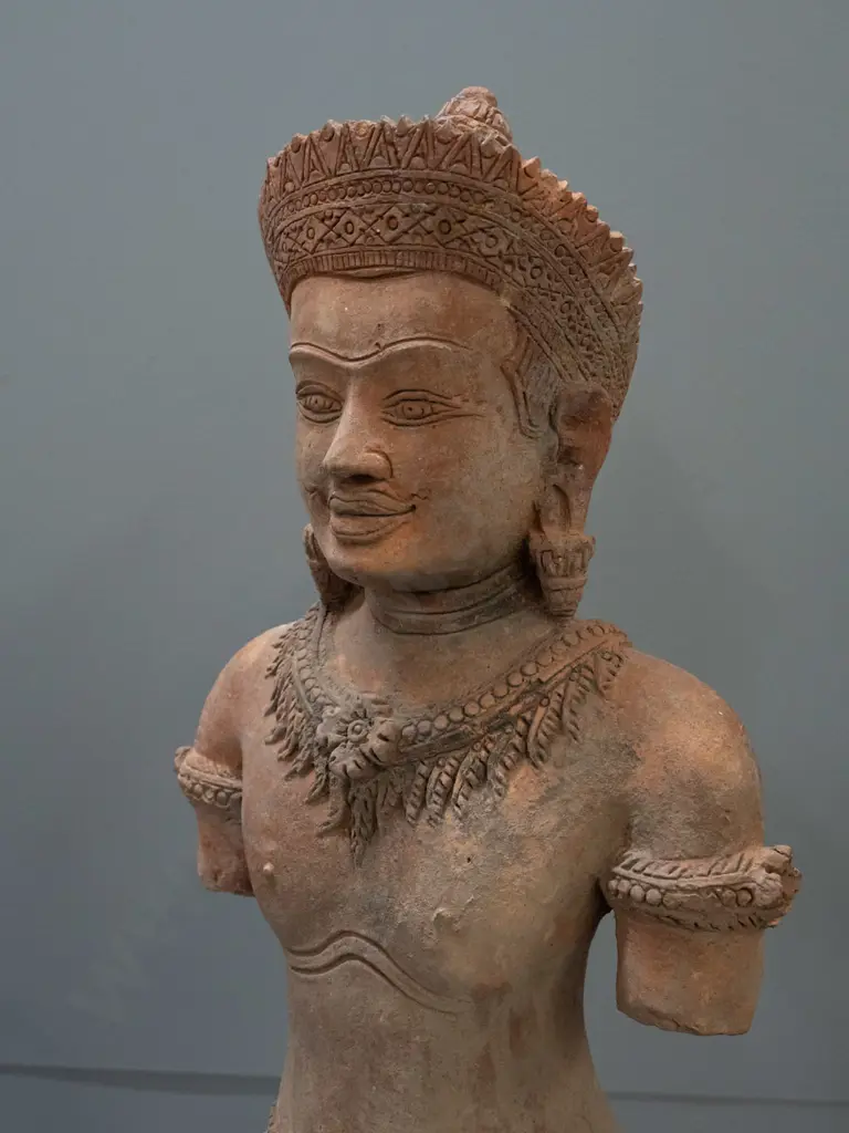 Cambodian carved sandstone figure on stand - stand needs attention - black plastic sections coming loose. H-570 W-200 Image 1++